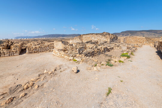 The ruins of the ancient 3rd Century BC fortified port city of Sumhuram, an import harbor for frankincense trade, at Khor Rori, or Khawr Rawri lagoon in the Dhofar region of Oman.