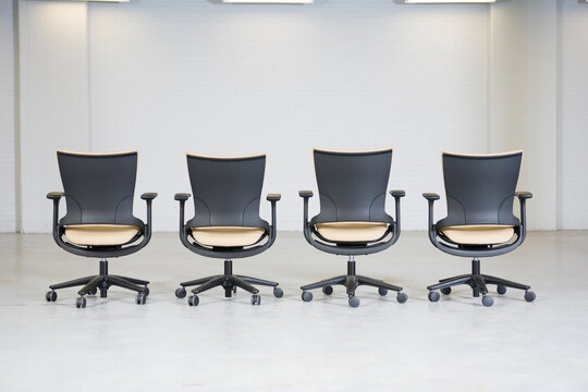 View of empty office chairs.