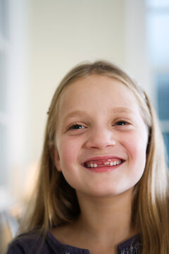 View of a girl smiling.