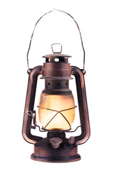 Fototapeta Gas lantern with burning light, isolated on a white background. An antique vintage lamp. Hipster accessory. Camping light. Interior decoration. Rusty, covered with patina. Wire handle obraz