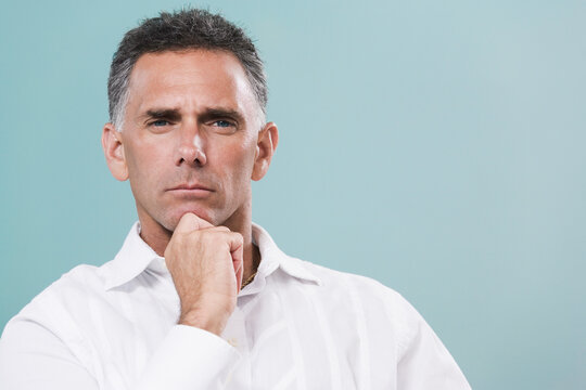 Portrait of a mid adult man thinking