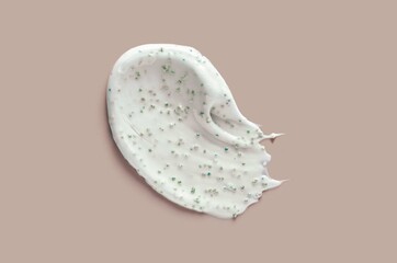 Scrub care cosmetics beige background isolated