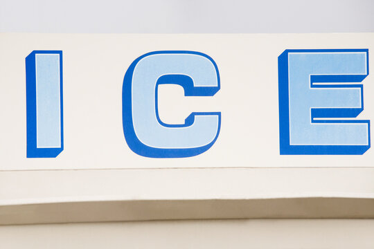 Close-up of the word ICE painted on a dispenser