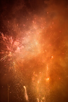 View of fireworks glittering in the sky.