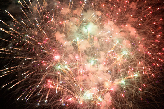 View of fireworks glittering in the sky.