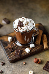 Hot chocolate with marshmallows on dark background. Hot beverage with cocoa 