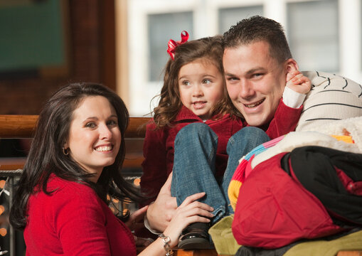 Portrait Of Parents With Young Daughter