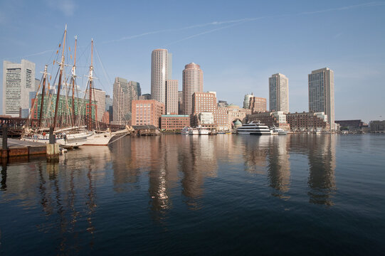 Boats with financial district on a harbor, Rowes Wharf, Boston Harbor, Boston, Massachusetts, USA