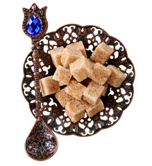 Ramadan concept, sugar in muslim bronze plate