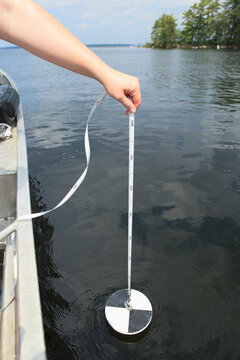 Water treatment engineer checking water quality turbidity
