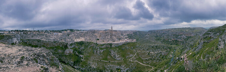 Fototapeta na wymiar Panoramic view of ancient cave dwellings, the Sassi in the town of Matera in Basilicata in southern Italy