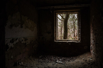 Fototapeta na wymiar old abandoned house window in Europe