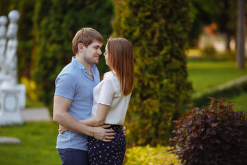 Fototapeta premium Couple in love in the park in the summer