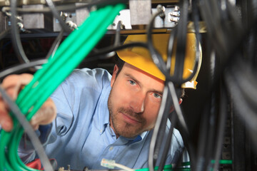 Network engineer bundling cable for structured cabling