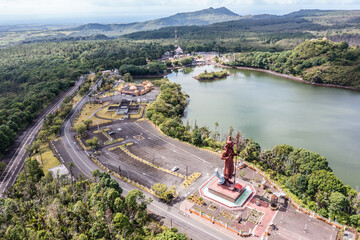 aerial video view of area around Ganga Talao ( Grand Bassin) a crater lake  in district of Savanne, Mauritius with 
"The She Mandir" temple dedicated to Lord Shiva and other temples. K4 footage