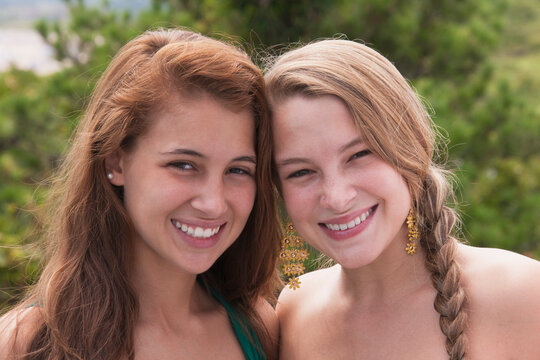 Portrait of two sisters smiling together