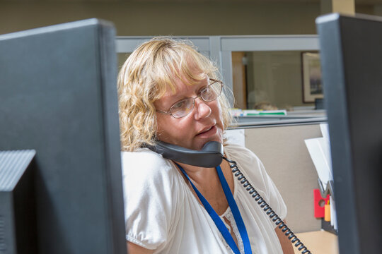 Female executive working in customer service center of electric power plant