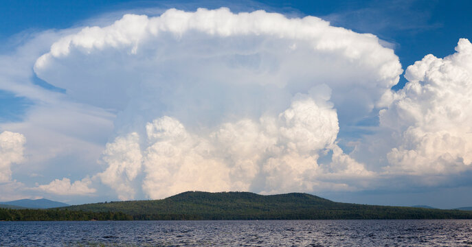 Cumulonimbus clouds over Lake Umbagog, New Hampshire, USA