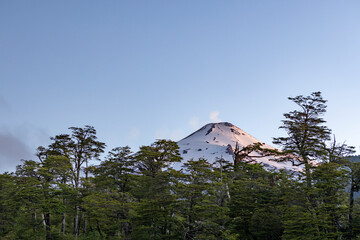 Villarrica volcano in the setting sun; Pucon, Chile 