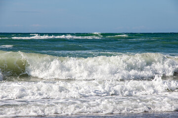 Blue Ocean, Beach, Waves Crashing and Ships in Distant in Denmark Coastline