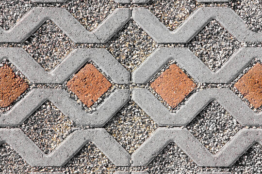 Concrete self locking tiled and draining flooring blocks assembl