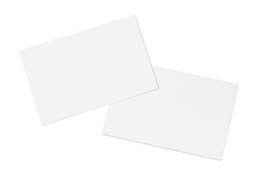 Two paper or plastic pieces (cards, tickets, flyers, invitations, coupons, banknotes, etc.), isolated on white background