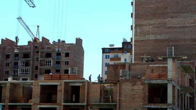 Construction of residential buildings. Shooting of