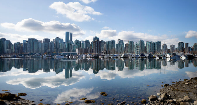 Cityscape view of the coastal city of Vancouver, Canada during the day; Vancouver, British Columbia, Canada