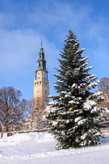 Christmas tree in front of Jasna Gora. Snow. Winter landscape of Częstochowa. © shake_pl