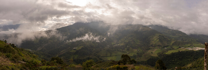 mountains and green hills with clouds in ecuador - obrazy, fototapety, plakaty