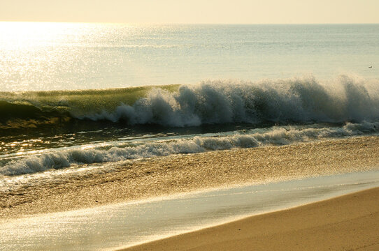 Waves crashing on a Cape Cod beach.; Cape Cod National Seashore, Massachusetts.