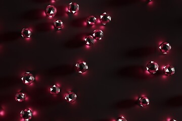 Glossy faceted balls glowing with purple pink light on a dark background, 3d rendering