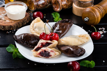 Dumplings with cherries with berry filling