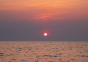 landscape viewpoint summer sea  wave on holiday calm coastal sunset sky light orange golden evening...
