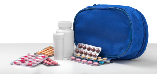 First aid kit with pills on the table