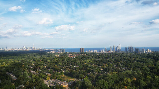 Aerial view over the Kingsway neighborhood of Toronto, Ontario, Canada. Looking southeast towards the downtown core Toronto skyline, Mimico and Lake Ontario.