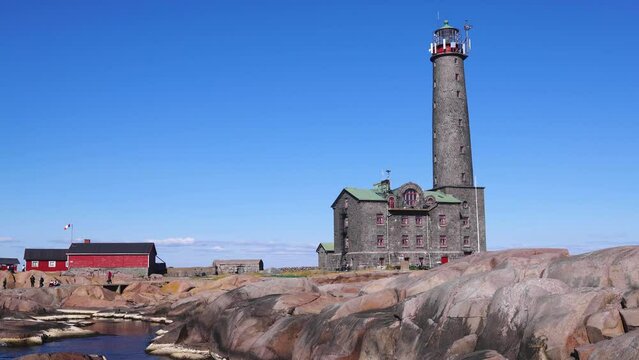Bengtsk&auml;r Lighthouse, summer view of Bengtskar island in Archipelago Sea, Southwest Finland, Kimito&ouml;n, Gulf of Finland sunny day
