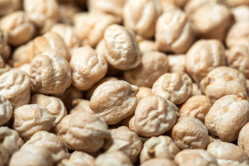 Dried raw chickpeas closeup. Organic food. Background of chickpeas. Legumes. Macro