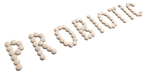 Collection of medical pills in the shape of probiotic text