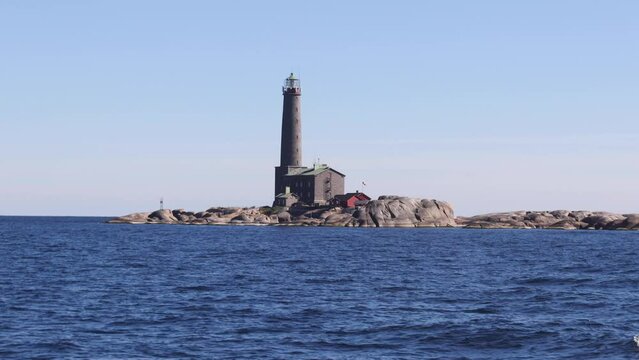 Bengtsk&auml;r Lighthouse, summer view of Bengtskar island in Archipelago Sea, Southwest Finland, Kimito&ouml;n, Gulf of Finland sunny day
