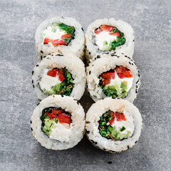 Set of maki sushi rolls with tuna, cucumber, seaweed and cream cheese.