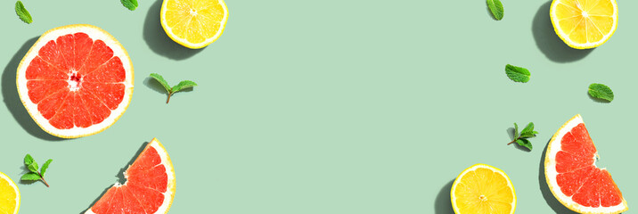 Fresh grapefruits and lemons overhead view - flat lay