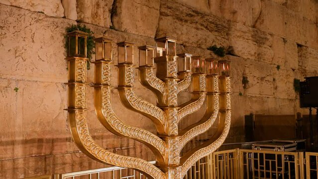 Hanukkah at the wailing wall in the old city of Jerusalem in Israel, panorama to the top