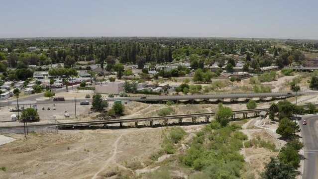 Traffic Driving on Numerous Roads and Bridges in Madera California USA Aerial Above High Angle