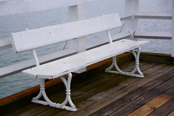 bench on the beach in the sopot - obrazy, fototapety, plakaty