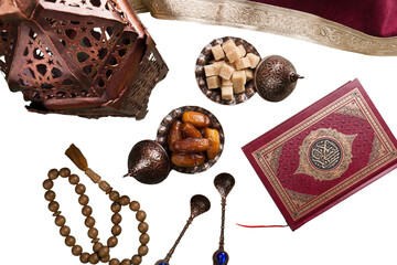 Composition with muslim lamp, holy book and arabic dessert