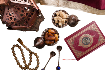 Composition with muslim lamp, holy book and arabic dessert