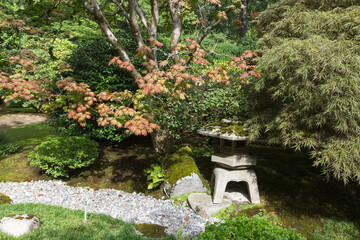 Fototapeta na wymiar Ancient Lantern in japanese garden of Seattle.