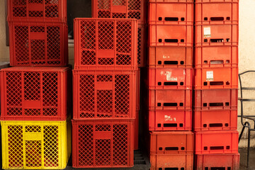 Plastic mesh box for vegetables and fruits. Plastic boxes for transporting vegetables and fruits. Delivery in plastic carriers