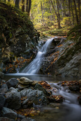 Fototapeta na wymiar Magical waterfall in hidden mountain